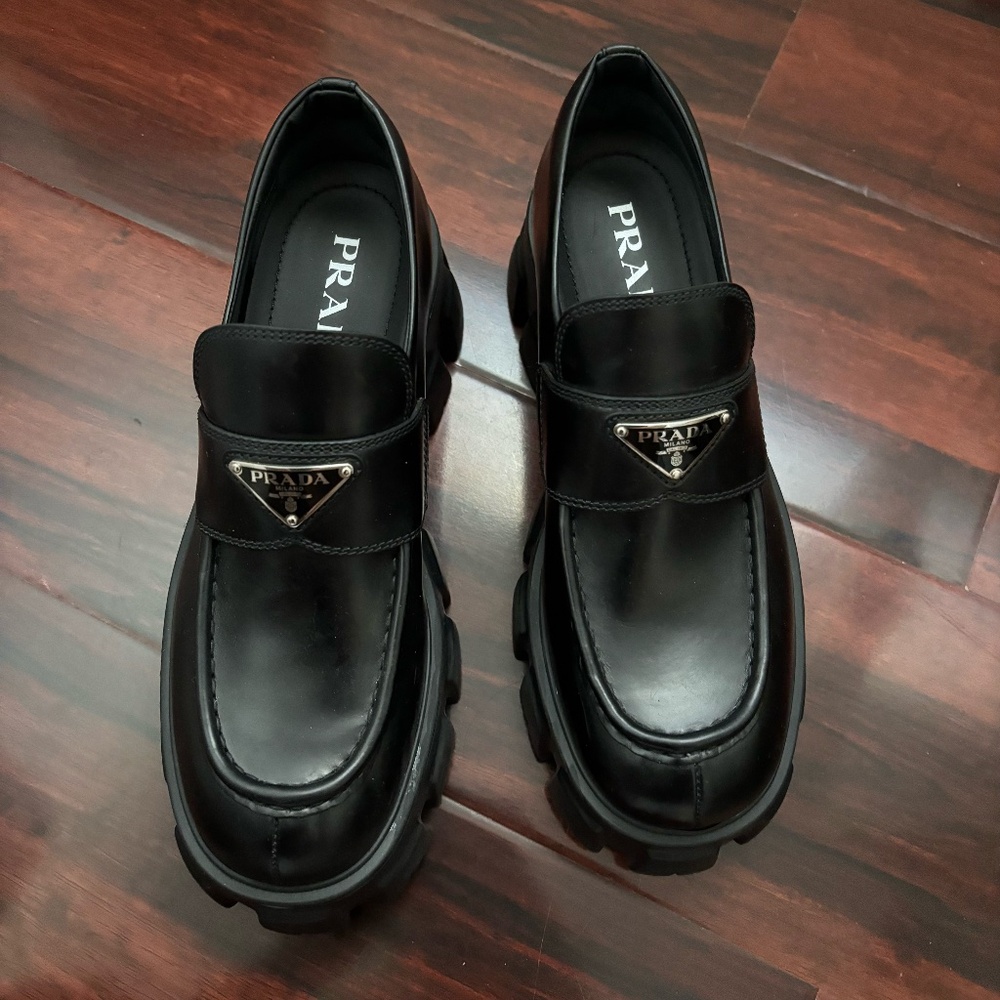Prada Black Leather Lug-Sole Loafers with Triangular Logo